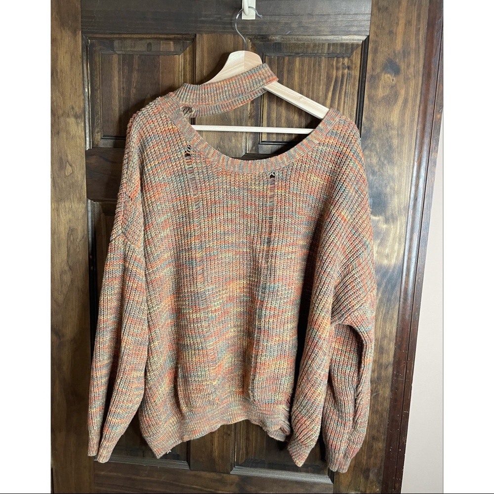 Distressed sweater